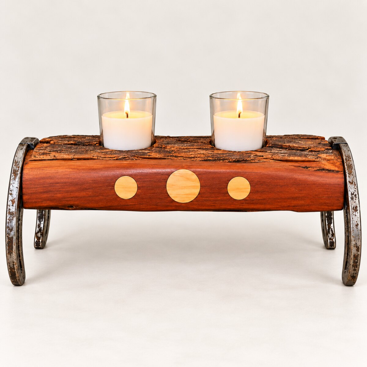 Rustic log candle holder with lit votives